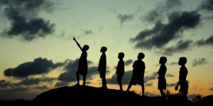 Children watching cloud formation