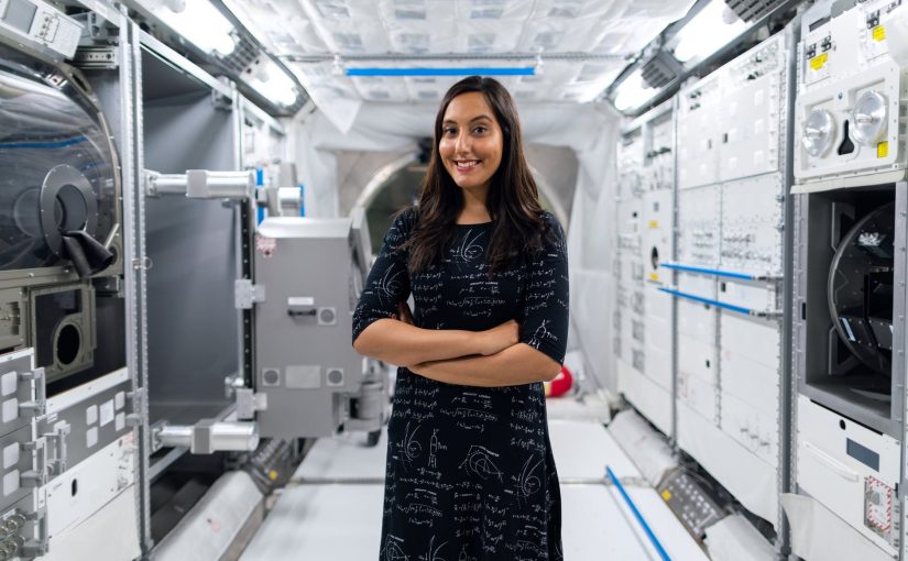 female engineer in space station